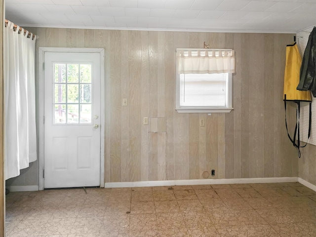 doorway with wooden walls