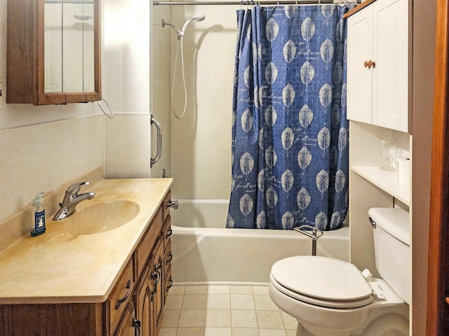 full bathroom featuring tile patterned flooring, shower / tub combo, vanity, and toilet