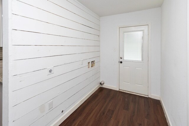 doorway featuring dark wood-type flooring