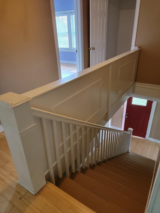 stairway with wood-type flooring