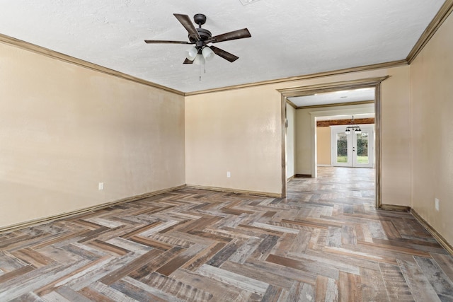 unfurnished room with french doors, ornamental molding, a ceiling fan, a textured ceiling, and baseboards