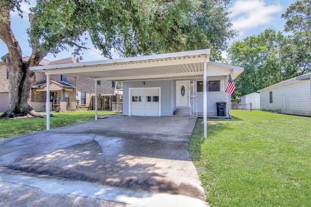 1105 W Dr, Port Neches, TX 77651 - view of front facade featuring asphalt driveway, a garage, and an attached carport