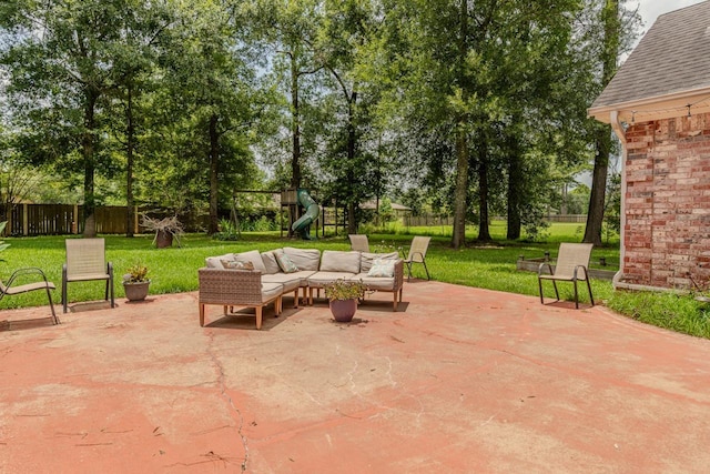 13475 Chimney Rock Dr, Beaumont, TX 77713 - fenced backyard featuring outdoor lounge area, a patio, and a playground
