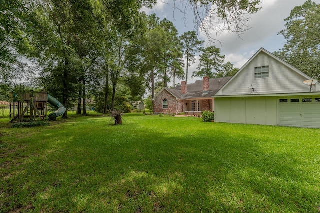 13475 Chimney Rock Dr, Beaumont, TX 77713 - view of green lawn featuring a playground