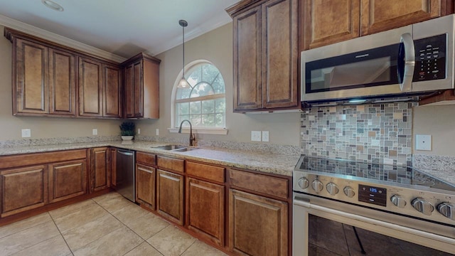 13475 Chimney Rock Dr, Beaumont, TX 77713 - kitchen with stainless steel appliances, decorative backsplash, decorative light fixtures, light tile patterned floors, and light stone countertops