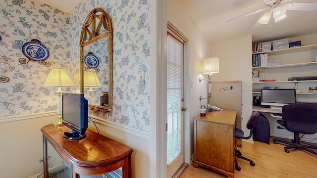 6225 Pansy Dr, Beaumont, TX 77706 - office area featuring wallpapered walls, wood finished floors, a ceiling fan, and healthy amount of natural light