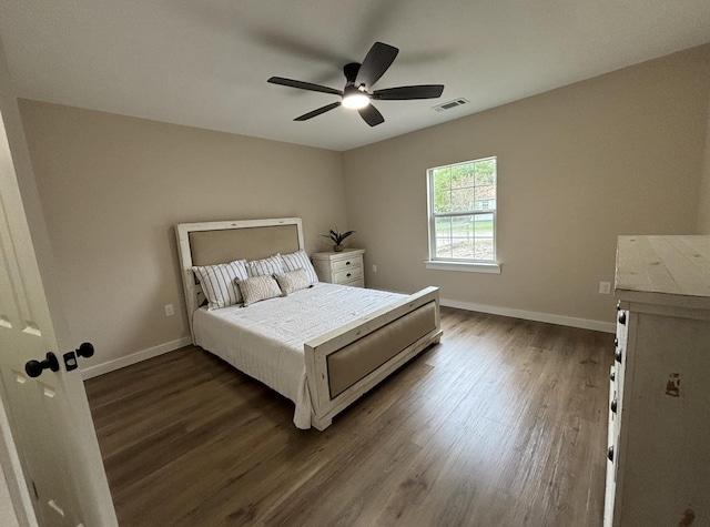 bedroom featuring ceiling fan and wood-type flooring