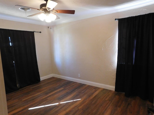 unfurnished bedroom featuring dark wood-style floors, a ceiling fan, and baseboards