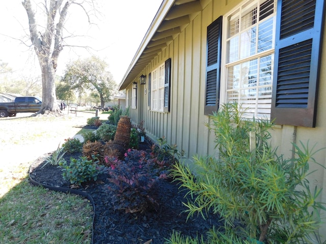 view of side of property with board and batten siding