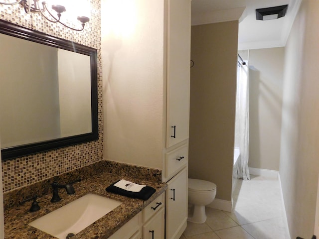 full bath featuring toilet, vanity, backsplash, tile patterned floors, and shower / bath combination with curtain