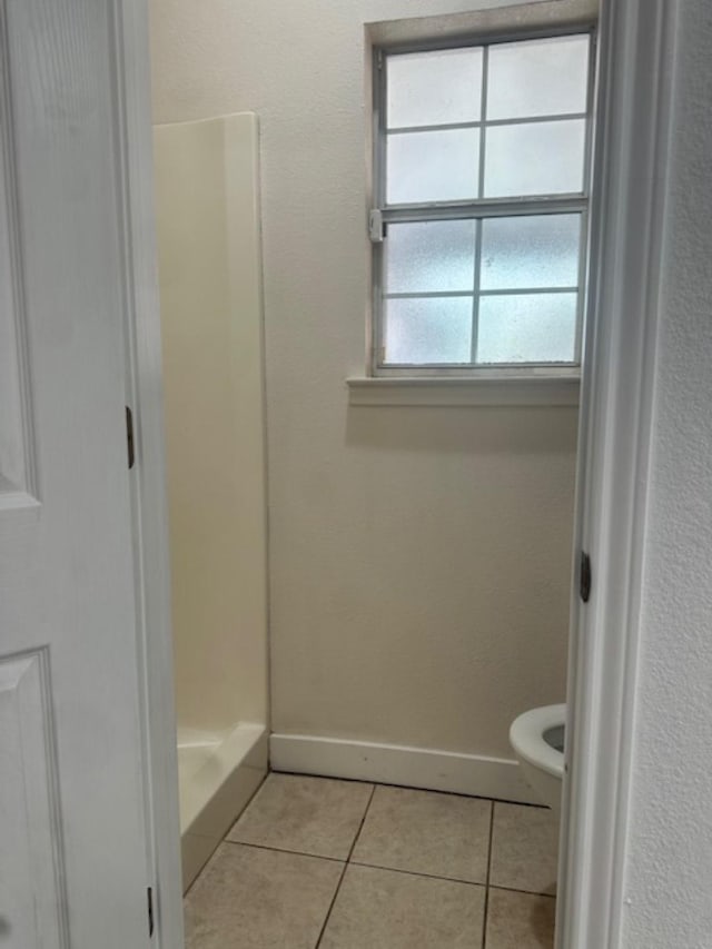 10994 Bessie Heights Rd, Orange, TX 77630 - bathroom with tile patterned flooring and a shower