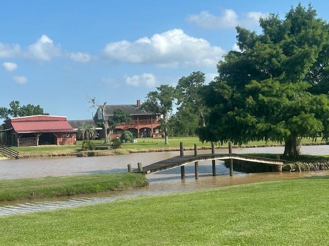 10994 Bessie Heights Rd, Orange, TX 77630 - view of property's community featuring a yard and a water view