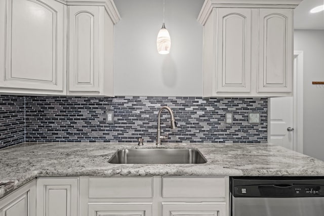 6605 Palace Dr, Lumberton, TX 77657 - kitchen with a sink, dishwasher, decorative backsplash, hanging light fixtures, and light stone countertops