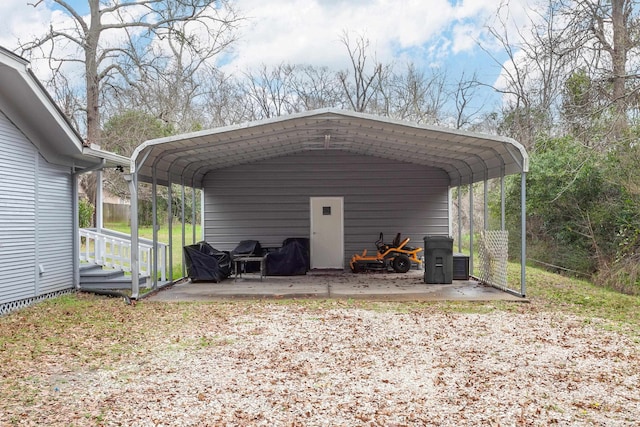 view of vehicle parking featuring a carport