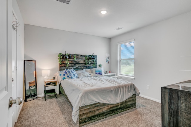 1560 Alice Dr, Beaumont, TX 77705 - carpeted bedroom with baseboards