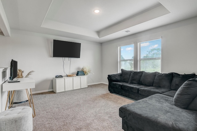 1560 Alice Dr, Beaumont, TX 77705 - living room with a raised ceiling, light colored carpet, baseboards, and recessed lighting