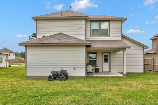 1560 Alice Dr, Beaumont, TX 77705 - rear view of property featuring a patio area and roof with shingles