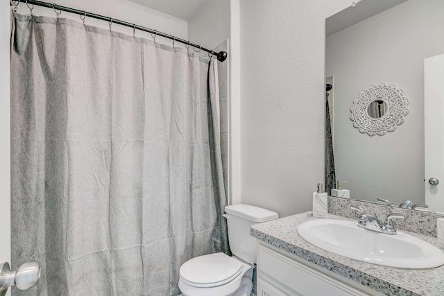 1560 Alice Dr, Beaumont, TX 77705 - full bathroom with vanity, toilet, and a shower with curtain