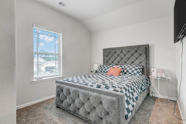 1560 Alice Dr, Beaumont, TX 77705 - carpeted bedroom featuring baseboards and vaulted ceiling