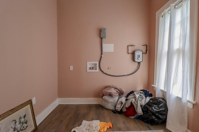 laundry room with washer hookup and wood-type flooring