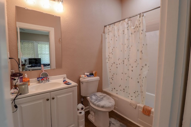 full bathroom with vanity, shower / bathtub combination with curtain, and toilet