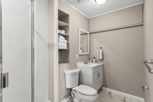 bathroom with ornamental molding, built in shelves, vanity, toilet, and a shower with shower door