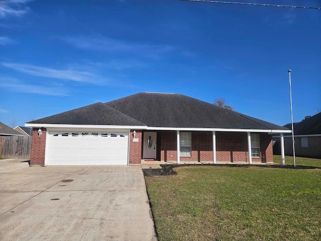 single story home featuring a garage, brick siding, a shingled roof, concrete driveway, and a front yard