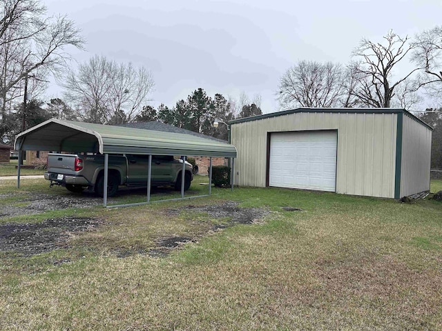 detached garage with driveway and a carport