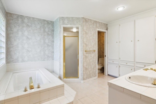 full bathroom featuring tile patterned flooring, ornamental molding, toilet, and plus walk in shower