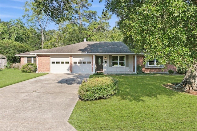 single story home featuring a front yard and a garage