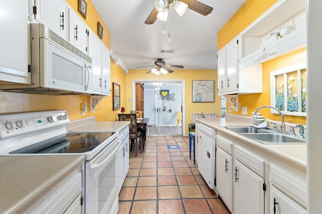 9055 Glen Mdw, Beaumont, TX 77706 - kitchen featuring white appliances, ceiling fan, and white cabinetry