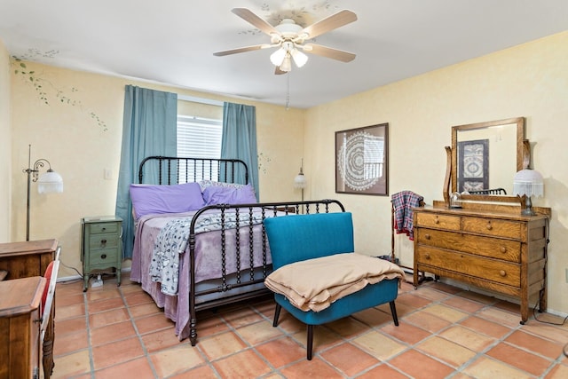 9055 Glen Mdw, Beaumont, TX 77706 - bedroom with a ceiling fan and light tile patterned floors