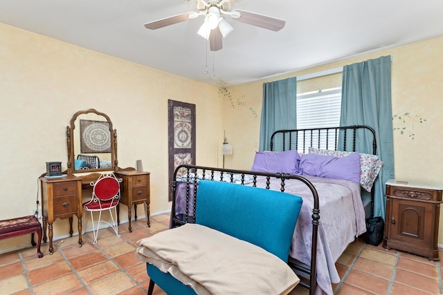 9055 Glen Mdw, Beaumont, TX 77706 - bedroom with a ceiling fan and tile patterned floors
