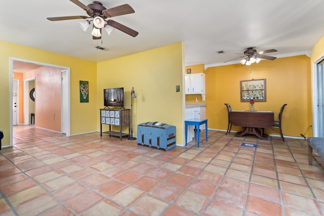 9055 Glen Mdw, Beaumont, TX 77706 - living room with a ceiling fan and baseboards