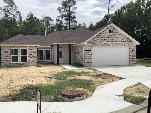 single story home featuring a garage