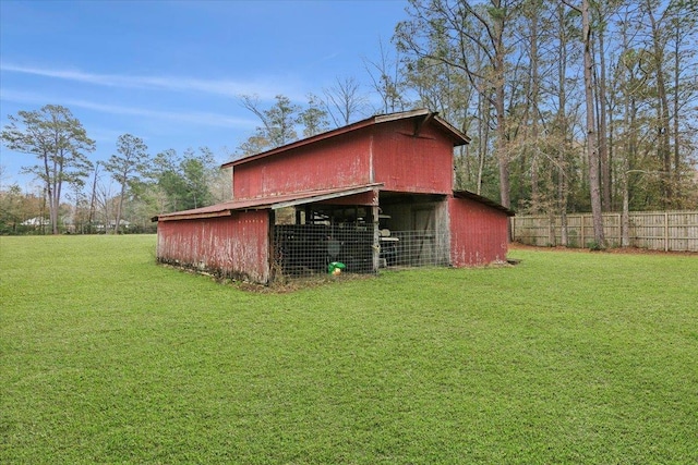 view of outdoor structure featuring a yard