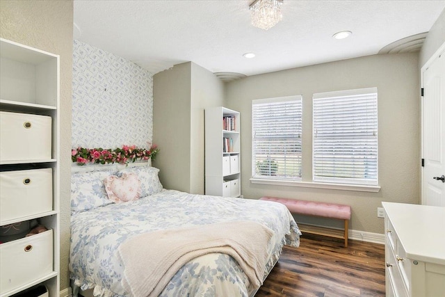 bedroom featuring dark wood-type flooring