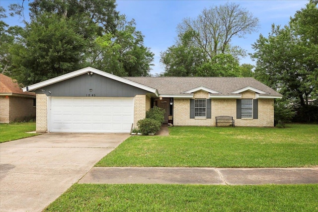 single story home with a front yard, driveway, a garage, and brick siding