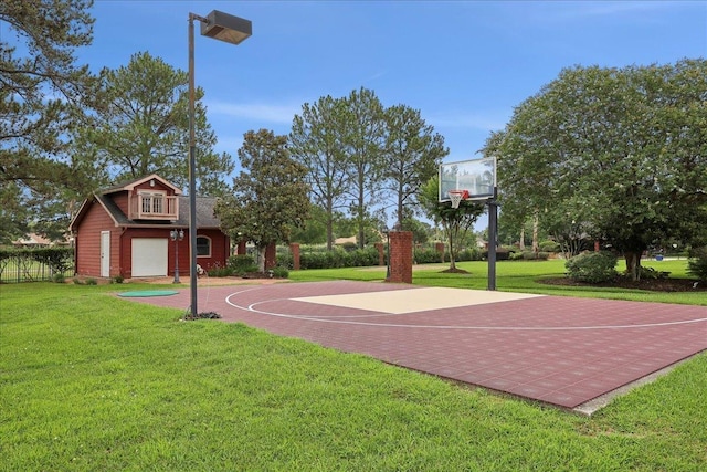 7510 Shadow Creek Dr, Beaumont, TX 77707 - view of sport court with basketball hoop and a lawn