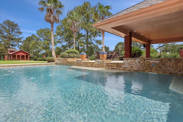 7510 Shadow Creek Dr, Beaumont, TX 77707 - swimming pool with a patio area