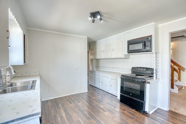 kitchen featuring dark hardwood / wood-style flooring, sink, white cabinetry, and black appliances