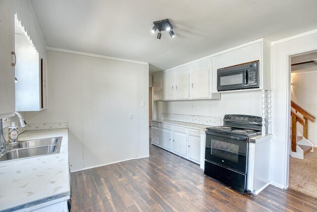 kitchen featuring dark hardwood / wood-style flooring, sink, white cabinetry, and black appliances