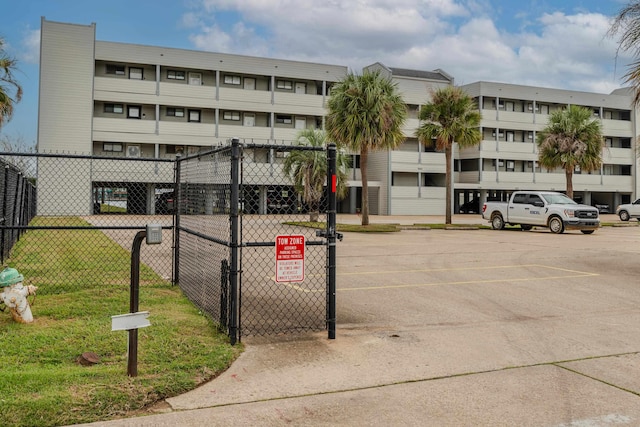 580 Pleasure Island Island, Port Arthur, TX 77640 - view of apartment building / complex with uncovered parking