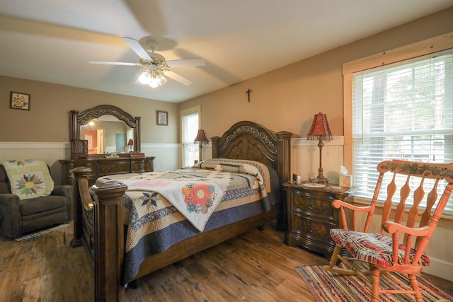 bedroom featuring ceiling fan and hardwood / wood-style flooring