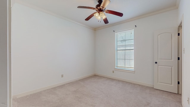 unfurnished room with light carpet, ceiling fan, ornamental molding, and baseboards