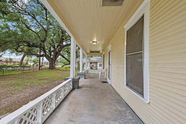 view of patio featuring a porch and visible vents