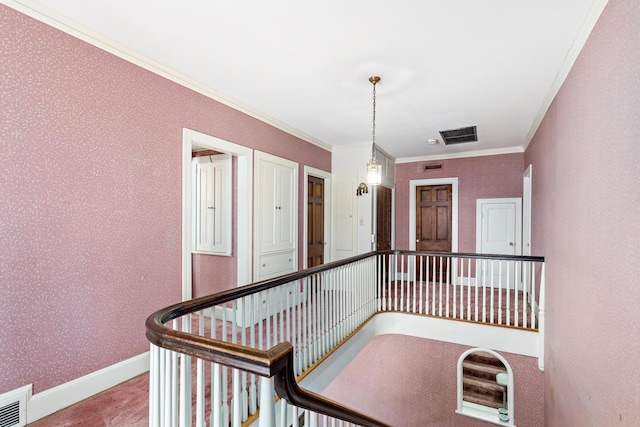 hall featuring ornamental molding