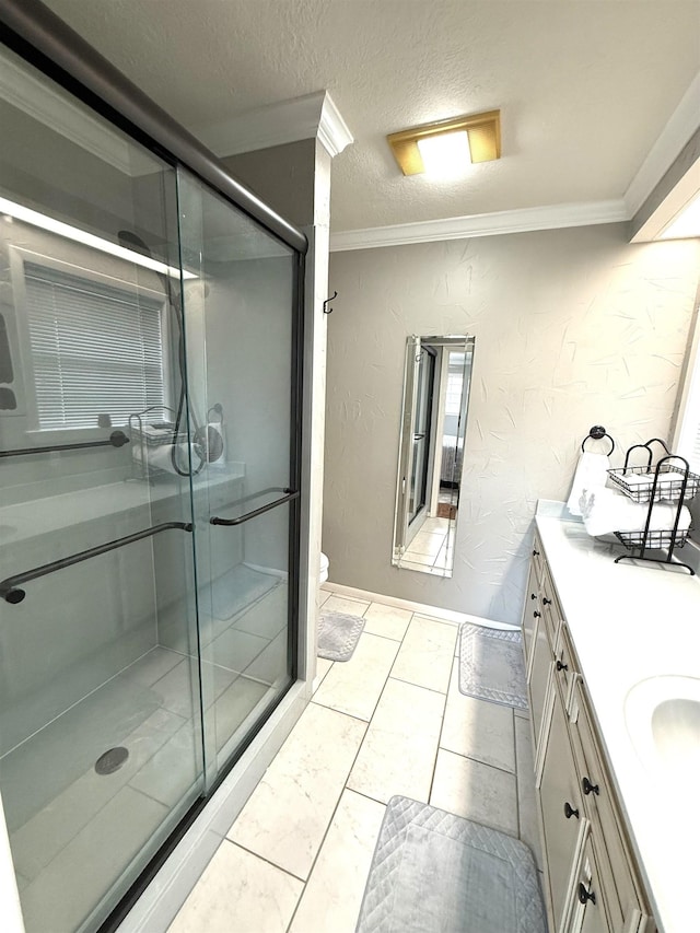 bathroom with toilet, ornamental molding, a shower stall, and vanity