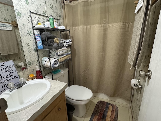 bathroom with tile patterned flooring, vanity, toilet, and a shower with shower curtain