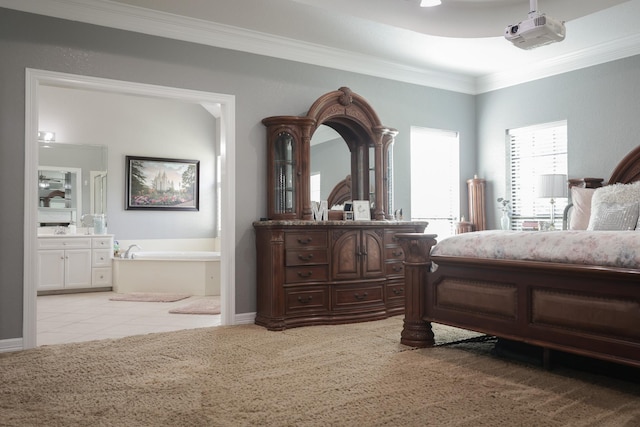 5200 N Fm 105, Vidor, TX 77662 - bedroom with crown molding, connected bathroom, light colored carpet, and light tile patterned floors